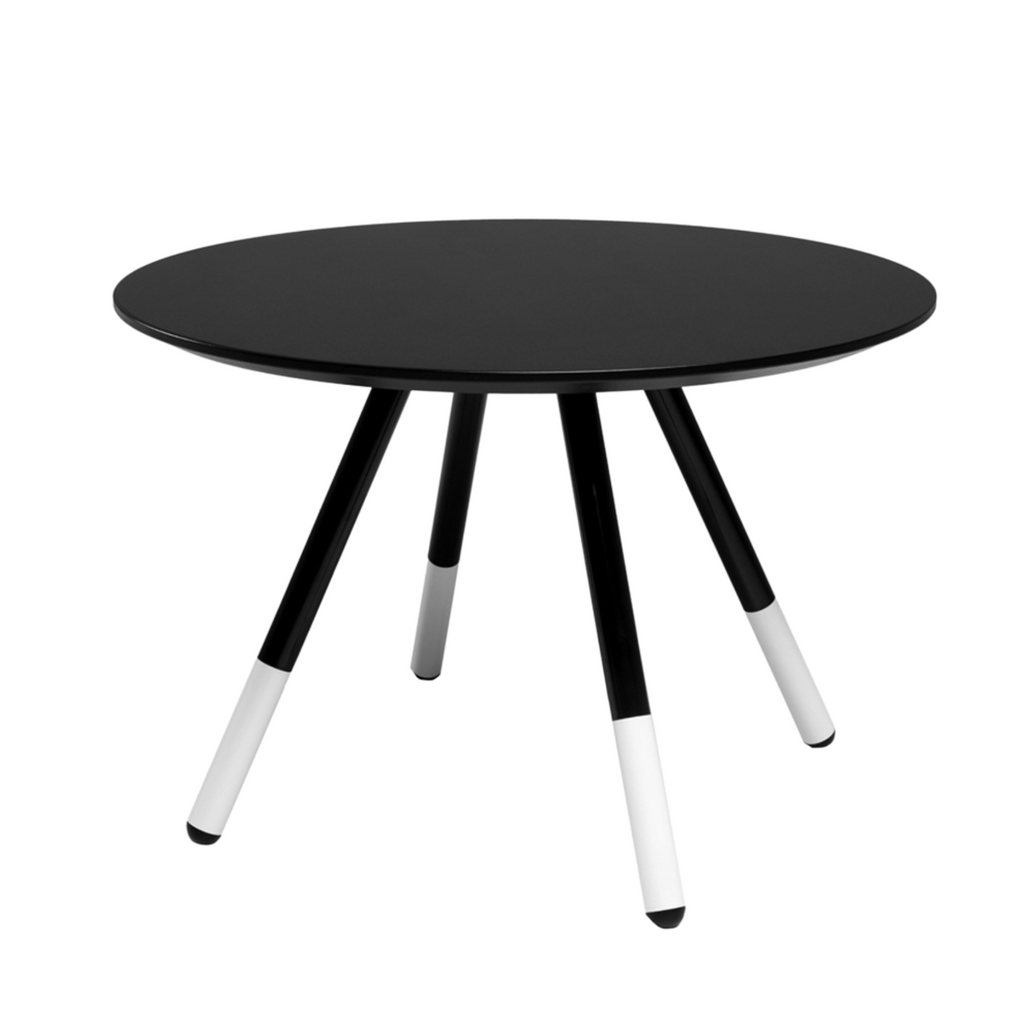 Daywalker coffee table with a black tabletop and black-and-white legs, 75 cm diameter.